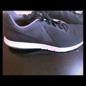 All black nike running shoes